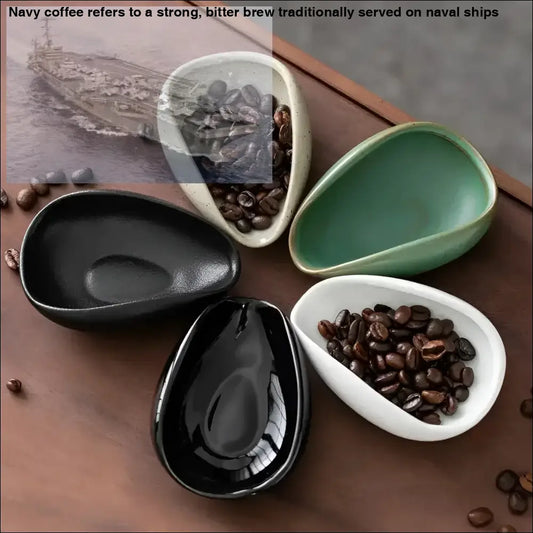 Assorted teardrop-shaped ceramic bowls for coffee beans dosing in Dosing Cup Trays